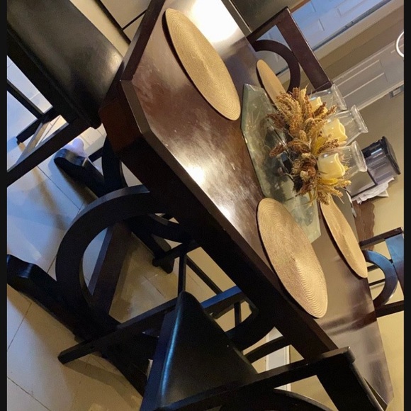 Table comes with 4 chairs ! No tears on them